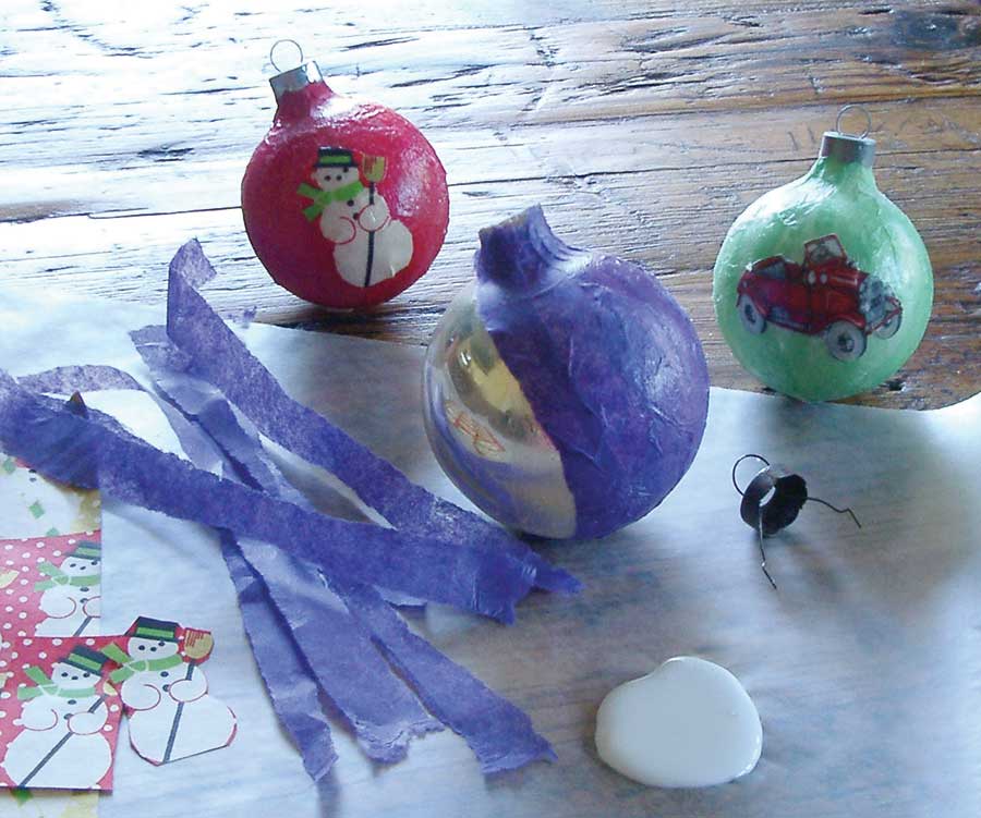 Repurposed tissue paper and gift wrap give old glass ornaments a new face.